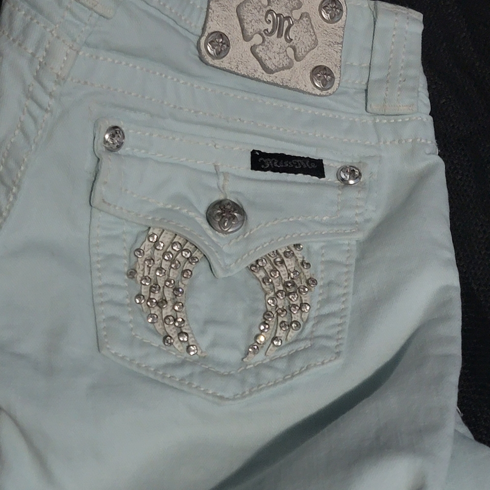 Miss Me Icy Blue Embellished Jeans. Angel Wings on back pockets.